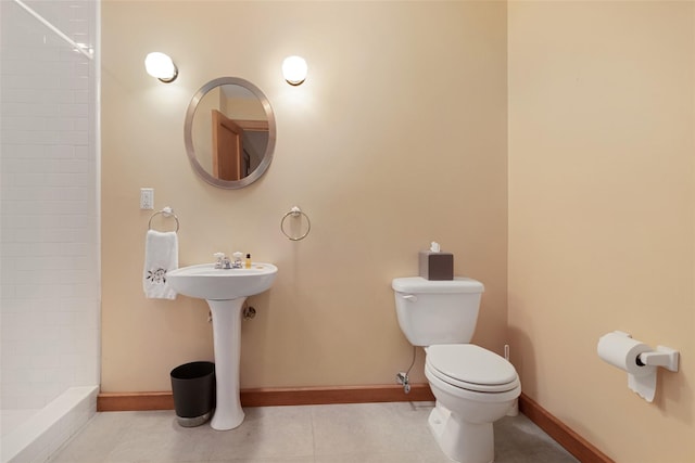 27 Dingle Ridge Rd, North Salem, NY 10560 - bathroom with toilet, tiled shower, baseboards, and tile patterned floors