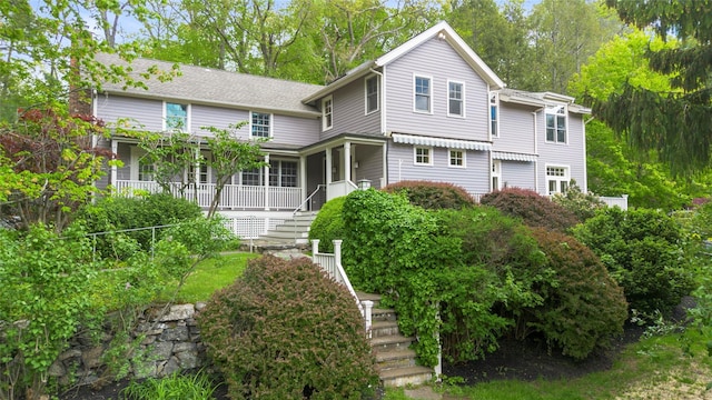 27 Dingle Ridge Rd, North Salem, NY 10560 - view of front of property with stairway and covered porch
