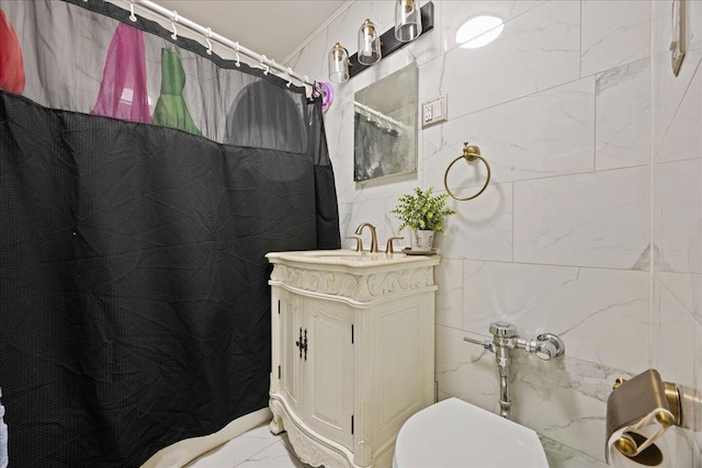 full bath featuring vanity, marble finish floor, a shower with curtain, and toilet