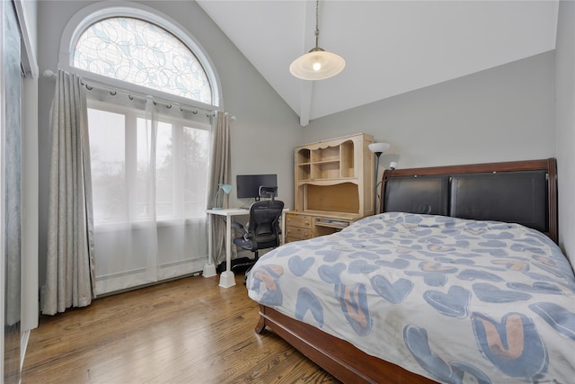 8 Percheron Ln, Roslyn Heights, NY 11577 - bedroom with wood finished floors and high vaulted ceiling