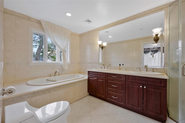 8 Percheron Ln, Roslyn Heights, NY 11577 - bathroom featuring tile walls, a sink, a bath, tile patterned floors, and visible vents