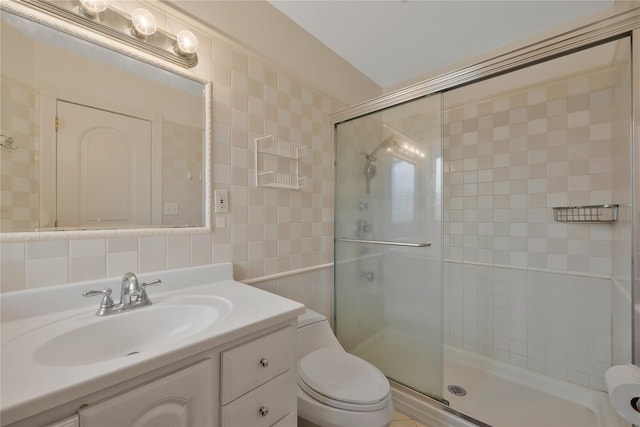 8 Percheron Ln, Roslyn Heights, NY 11577 - bathroom with decorative backsplash, a shower stall, tile walls, toilet, and vanity