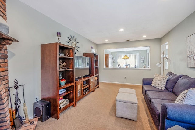 carpeted living room with baseboards and recessed lighting