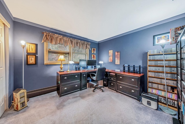 carpeted office space with baseboard heating