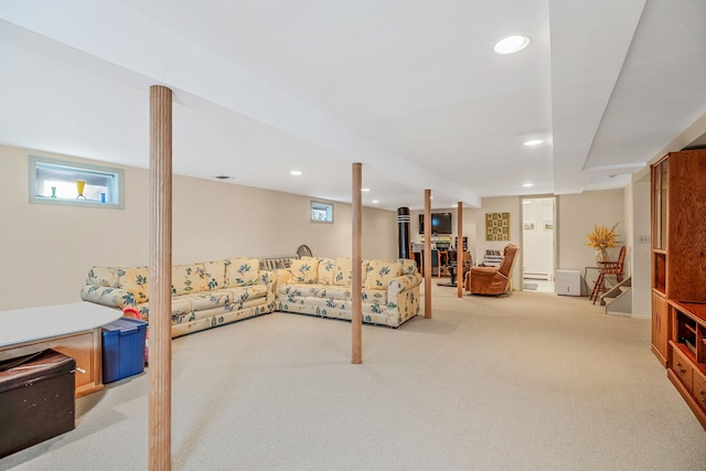 basement with light carpet and recessed lighting