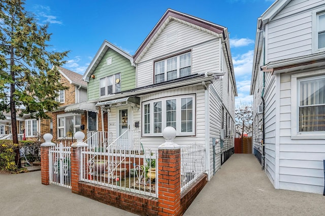 view of front of home with fence