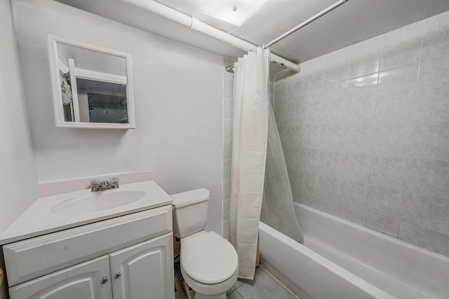 bathroom with shower / tub combo, toilet, and vanity