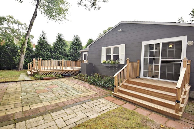 view of patio / terrace featuring a wooden deck
