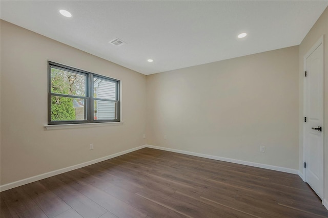 122 Knolls Dr Unit 122, Stony Brook, NY 11790 - unfurnished room featuring recessed lighting, baseboards, dark wood-style flooring, and visible vents