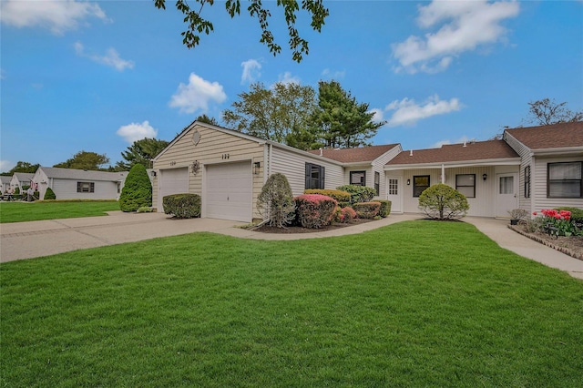 122 Knolls Dr Unit 122, Stony Brook, NY 11790 - single story home featuring an attached garage, a front lawn, and driveway
