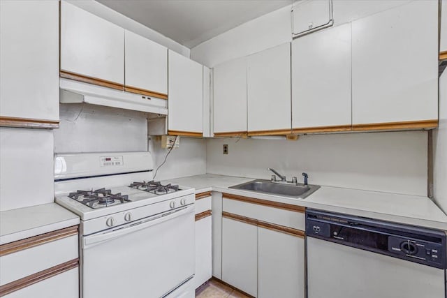 kitchen featuring a sink, under cabinet range hood, white cabinets, and white appliances