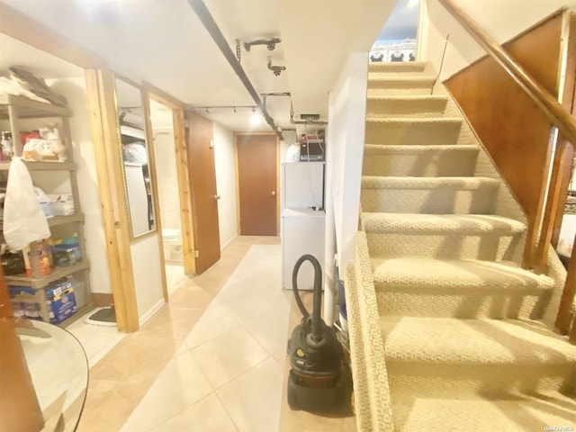 4947 166th St, Fresh Meadows, NY 11365 - stairway featuring tile patterned flooring and rail lighting