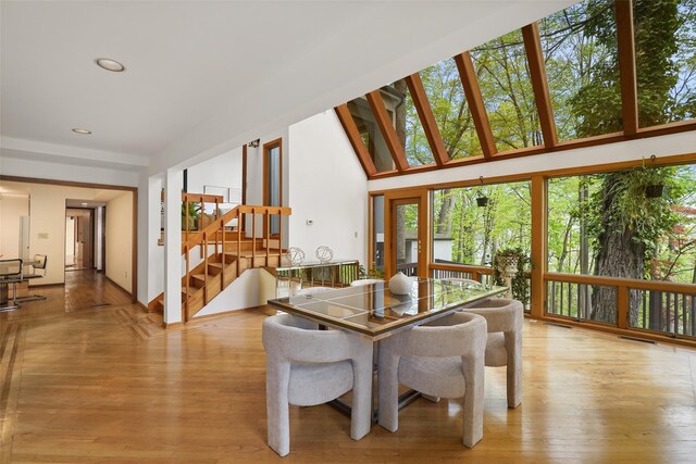 dining room with stairway, recessed lighting, light wood-style flooring, and visible vents