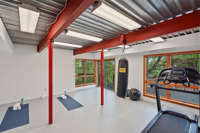 workout room with plenty of natural light