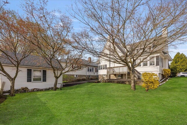 view of yard featuring a sunroom