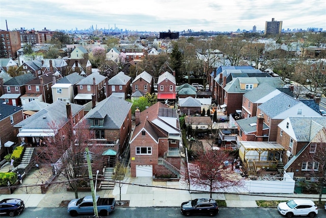 drone / aerial view with a view of city and a residential view