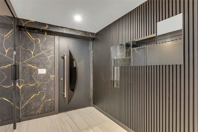 interior space with wallpapered walls