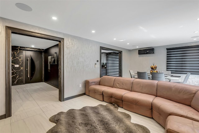 living area with recessed lighting and baseboards