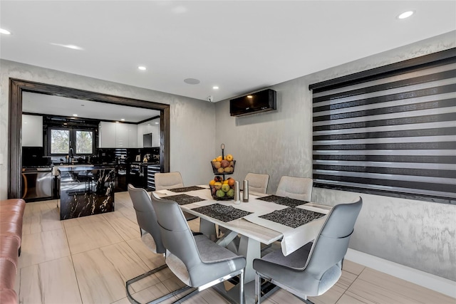 dining space with recessed lighting and light tile patterned floors