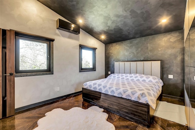 bedroom featuring recessed lighting, lofted ceiling, and baseboards