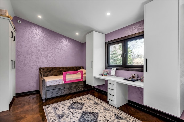 bedroom with recessed lighting, built in study area, and baseboards