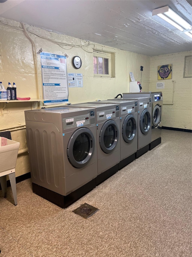 common laundry area featuring separate washer and dryer