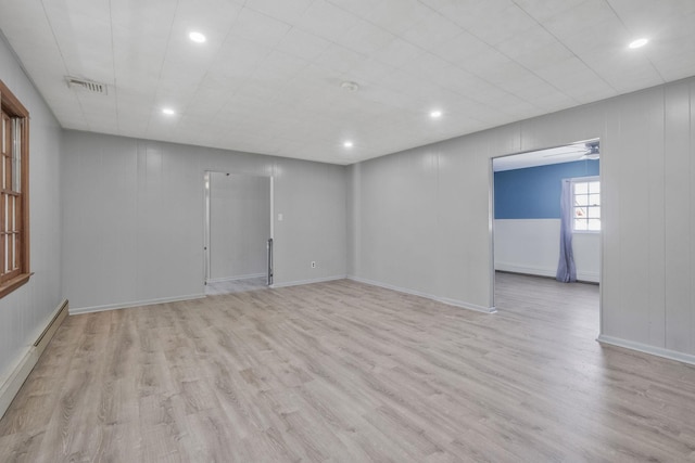 interior space featuring light wood-style flooring, baseboards, visible vents, recessed lighting, and baseboard heating