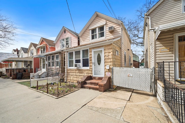107-50 90th St, Ozone Park, NY 11417 - view of front of property with fence and a residential view