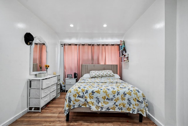 107-50 90th St, Ozone Park, NY 11417 - bedroom with wood finished floors, baseboards, and recessed lighting
