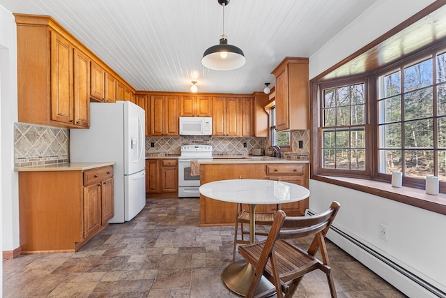 kitchen featuring light countertops, white appliances, stone finish flooring, a baseboard radiator, and brown cabinetry