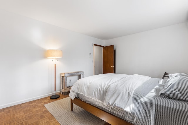 bedroom featuring baseboards