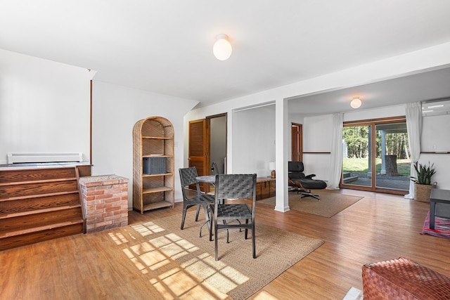 dining area featuring light wood-style floors