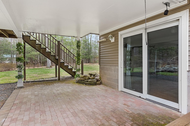 view of patio featuring stairway