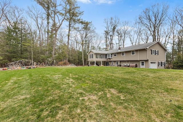 view of yard with an attached garage