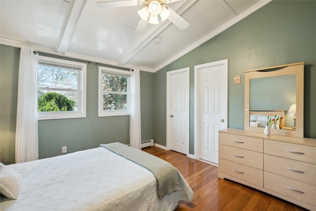 bedroom featuring baseboards, ceiling fan, vaulted ceiling with beams, hardwood / wood-style flooring, and a baseboard radiator