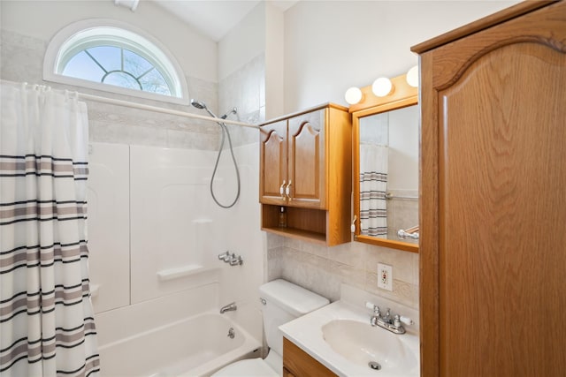 full bath with vanity, shower / bathtub combination with curtain, toilet, and tasteful backsplash