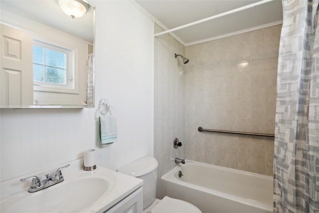 bathroom with crown molding, toilet, shower / bath combo, and vanity