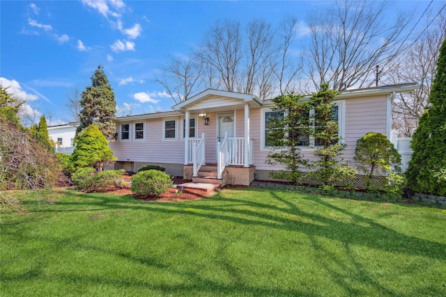 ranch-style home with a front yard