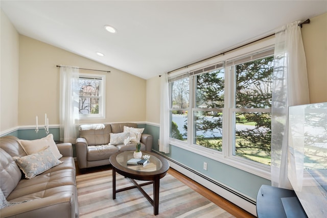 living area featuring wood finished floors, recessed lighting, a baseboard heating unit, and lofted ceiling