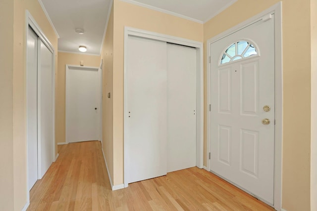 120 Locust Dr, Nyack, NY 10960 - foyer with light wood-style flooring and ornamental molding
