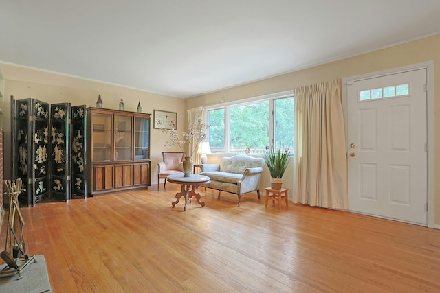 120 Locust Dr, Nyack, NY 10960 - entrance foyer with light wood-style flooring and ornamental molding