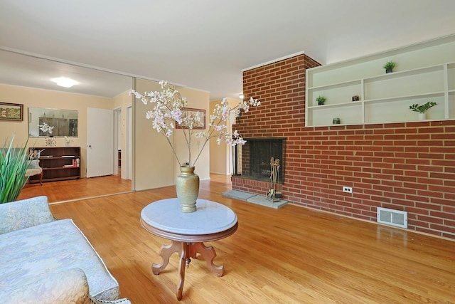 120 Locust Dr, Nyack, NY 10960 - living area featuring wood finished floors and a fireplace