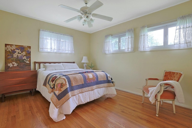 120 Locust Dr, Nyack, NY 10960 - bedroom with wood finished floors, crown molding, ceiling fan, and baseboards