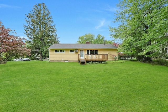 120 Locust Dr, Nyack, NY 10960 - back of property with a deck and a lawn