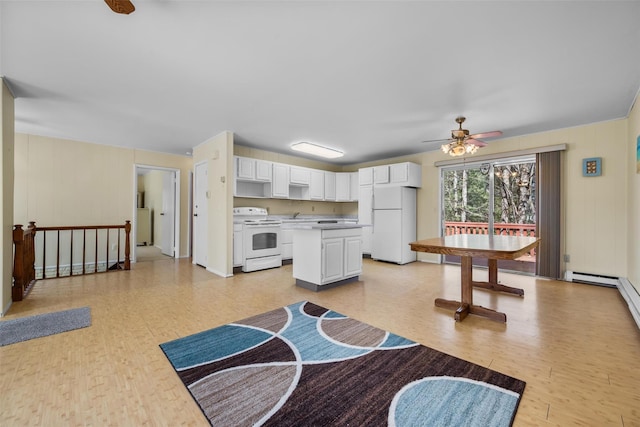 44 Nottingham Gate Rd, Rock Hill, NY 12775 - kitchen with white appliances, light wood-style floors, white cabinetry, and a ceiling fan