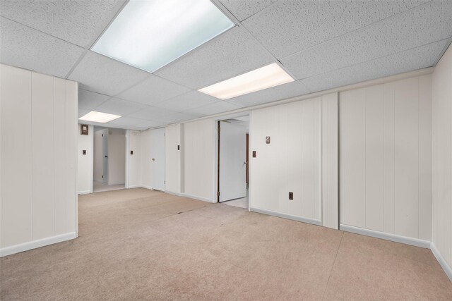 44 Nottingham Gate Rd, Rock Hill, NY 12775 - finished basement featuring a decorative wall, baseboards, a drop ceiling, and light colored carpet