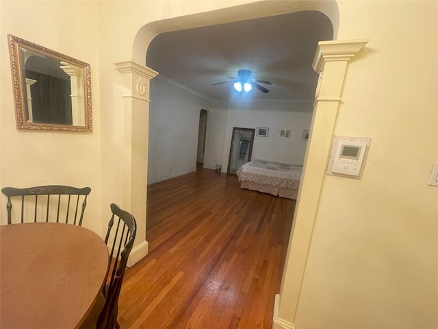 63-61 99th St Unit A4, Rego Park, NY 11374 - hall with arched walkways, wood-type flooring, and crown molding