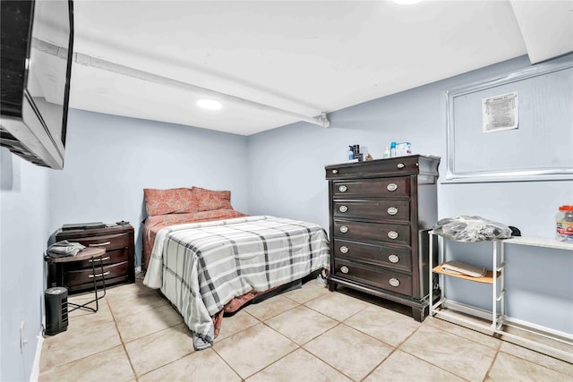 bedroom featuring light tile patterned flooring