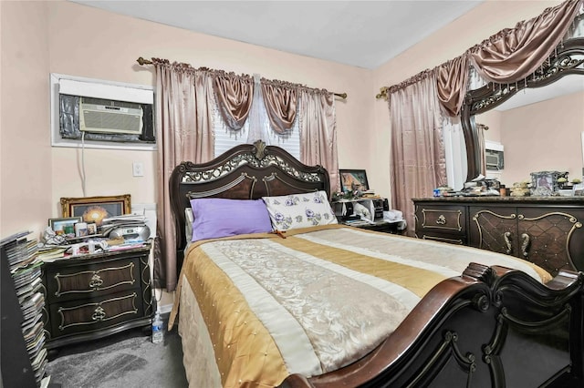 carpeted bedroom featuring an AC wall unit