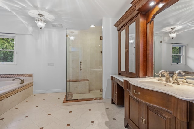 187 Jackson Ave, Pelham, NY 10803 - full bath with a garden tub, baseboards, a wealth of natural light, and a stall shower